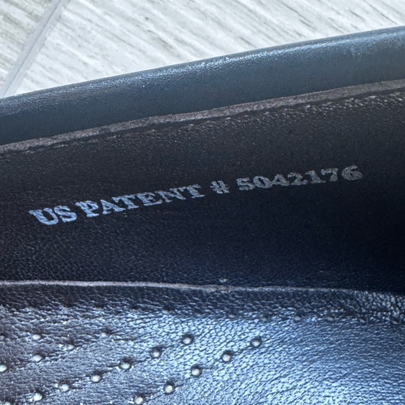 Cole Haan Black Leather Slip-On Shoes with Silver Detailing - Picture 4 of 6